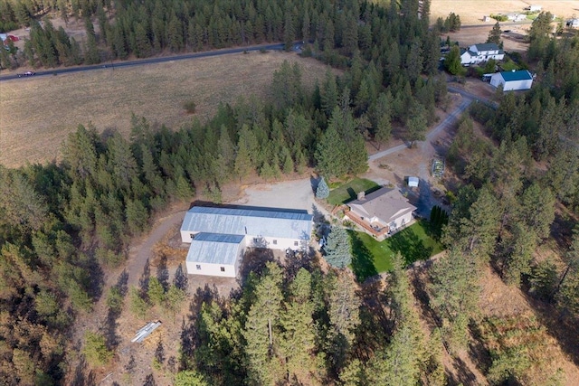 aerial view featuring a view of trees