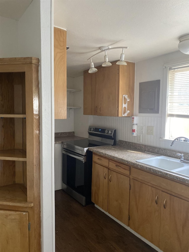 kitchen featuring a sink, electric range, open shelves, and dark wood-style flooring