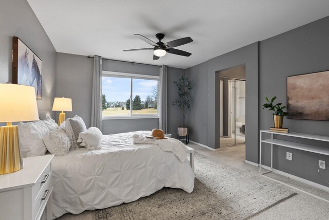 bedroom with ceiling fan, baseboards, and light carpet