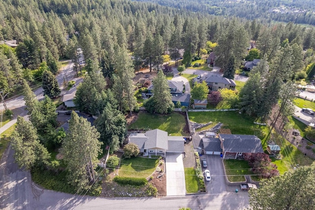 aerial view with a forest view and a residential view