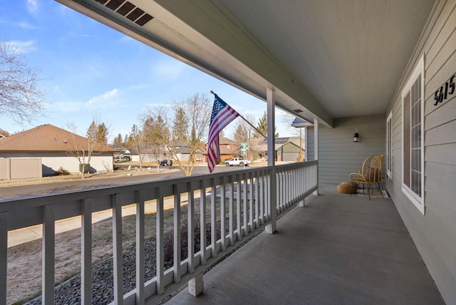 balcony featuring a residential view