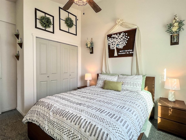 bedroom featuring a closet, baseboards, and carpet