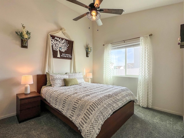 bedroom with baseboards, carpet, and a ceiling fan