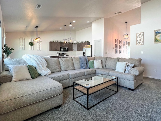 living room with carpet flooring, recessed lighting, baseboards, and visible vents