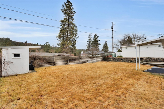 view of yard featuring fence