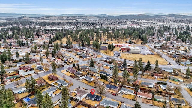 drone / aerial view with a residential view and a mountain view