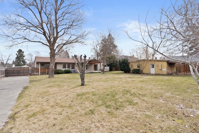 view of yard with fence