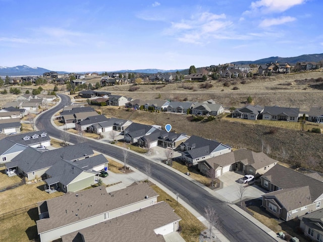 drone / aerial view with a mountain view and a residential view