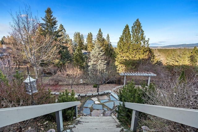 view of dock featuring fence