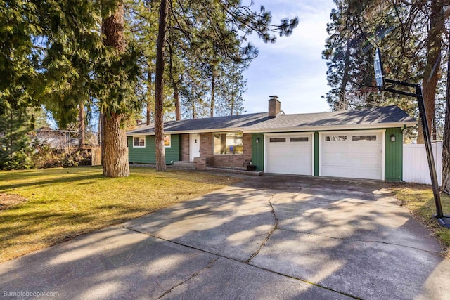 single story home featuring fence, an attached garage, a chimney, concrete driveway, and a front lawn