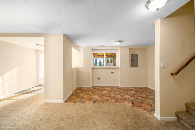 interior space with electric panel, baseboards, carpet floors, and stairs