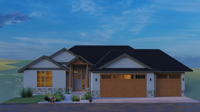 view of front of property featuring concrete driveway, an attached garage, and stone siding