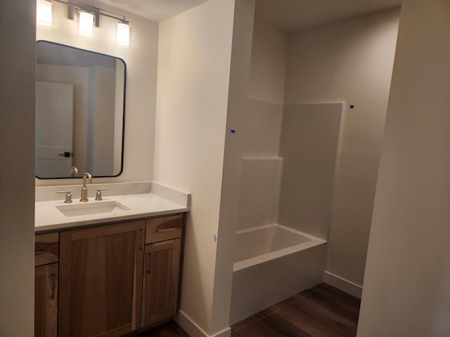 8712 E Ridgeline Ln, Spokane, WA 99217 - bathroom with wood finished floors and vanity