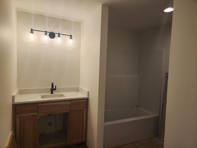 full bath with washtub / shower combination and vanity