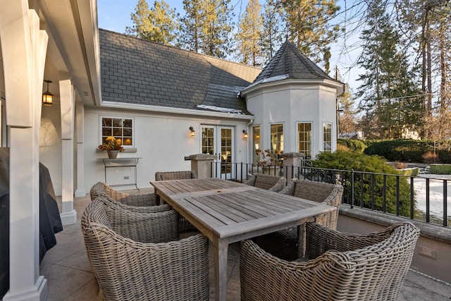 view of patio / terrace featuring outdoor dining area and french doors