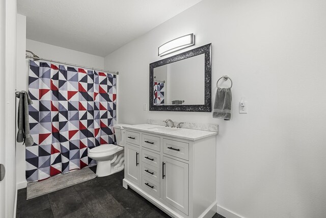 bathroom with toilet, curtained shower, vanity, and baseboards