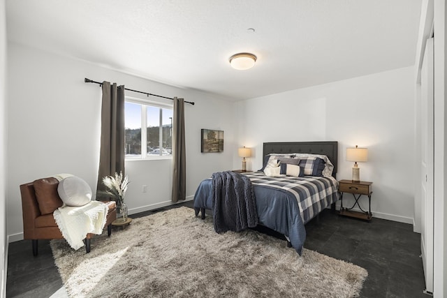 bedroom with baseboards