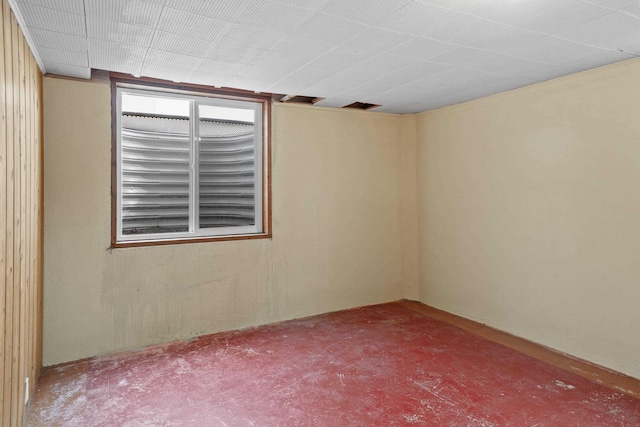 spare room with concrete floors