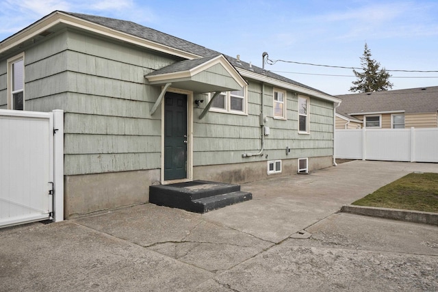 exterior space featuring a patio and fence