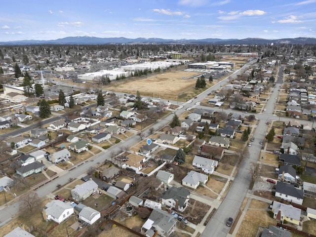 birds eye view of property with a residential view and a mountain view