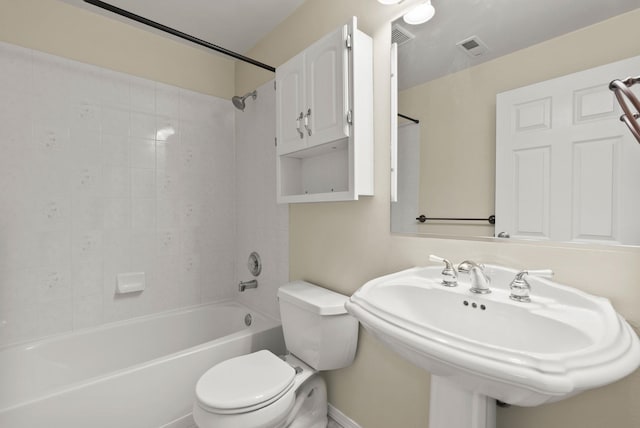 full bath with toilet, visible vents, shower / bathtub combination, and a sink