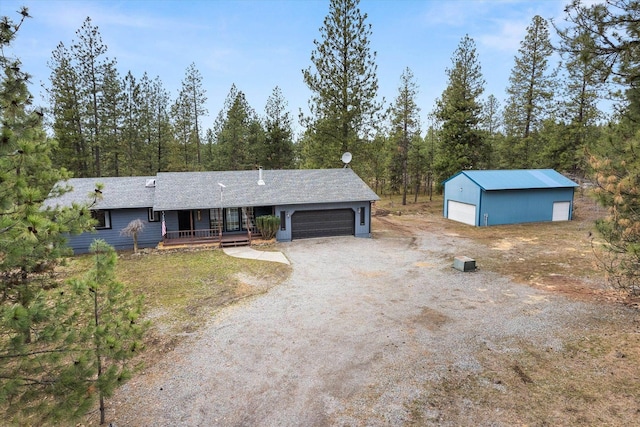 view of front of property featuring a garage and covered porch