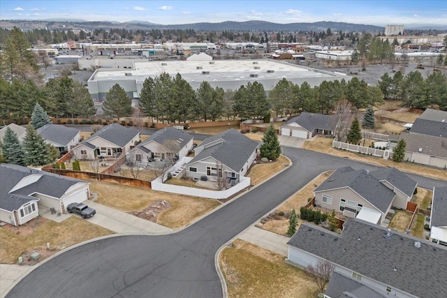 birds eye view of property featuring a mountain view and a residential view