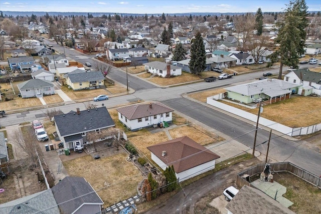 birds eye view of property with a residential view