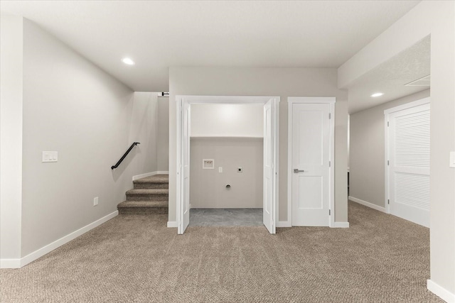 basement with light colored carpet, stairway, recessed lighting, and baseboards