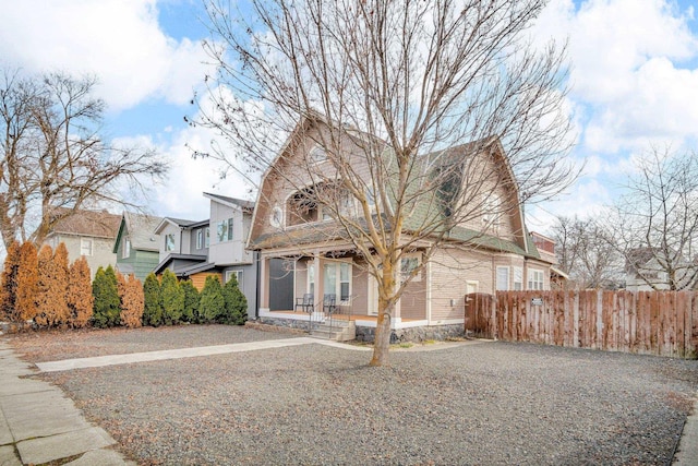 view of front of property with fence