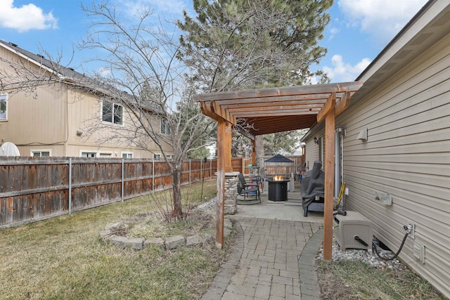 view of yard with fence private yard, a pergola, and a patio