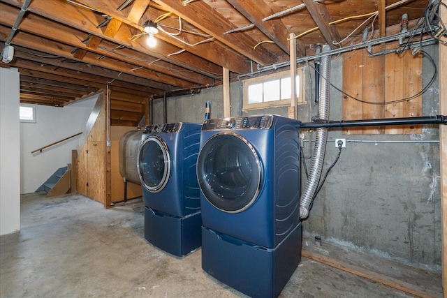 basement with washer and clothes dryer