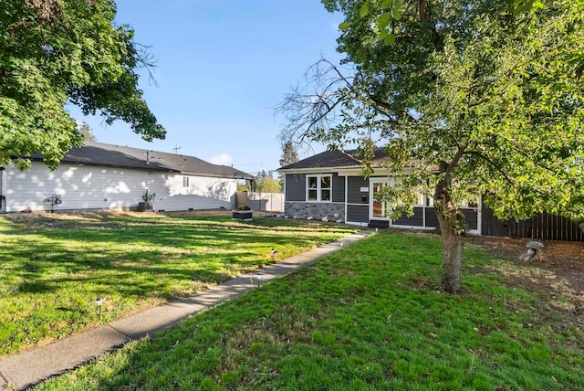 view of yard featuring fence