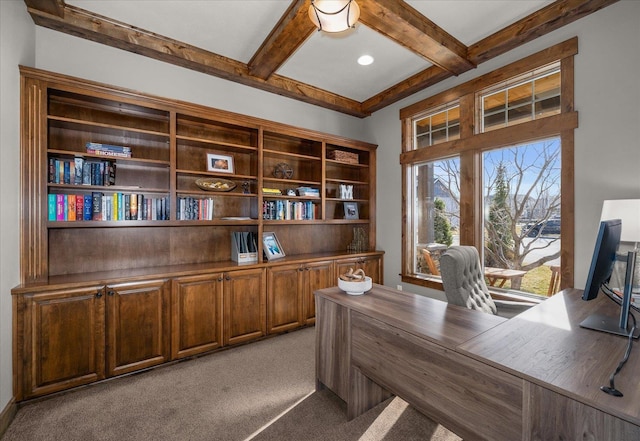 carpeted office with beam ceiling