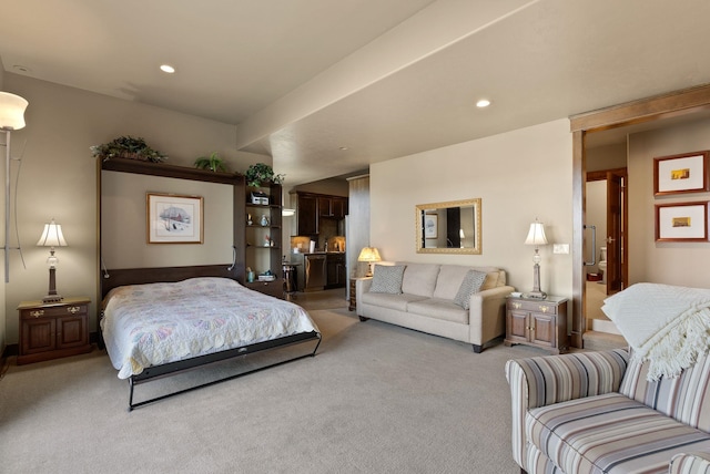 bedroom with light carpet and recessed lighting