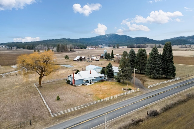 aerial view featuring a mountain view and a rural view