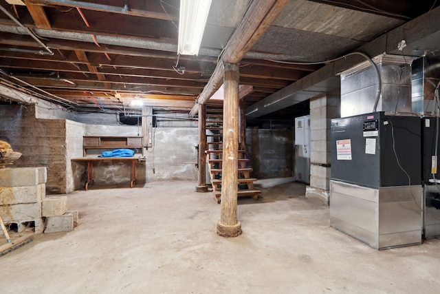 unfinished basement with heating unit