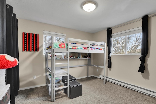 bedroom featuring carpet flooring, baseboards, and a baseboard radiator