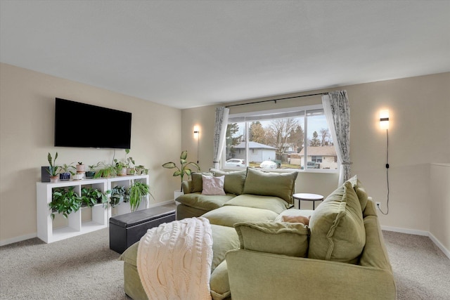 living room with baseboards and carpet