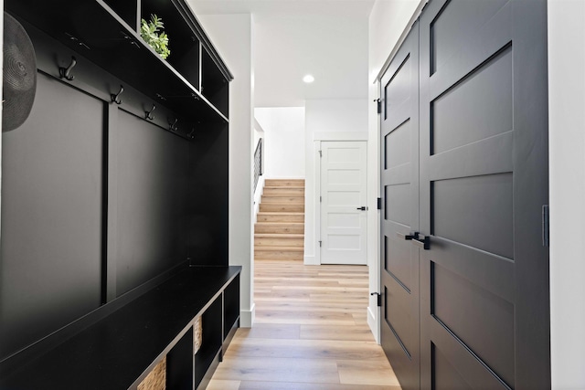 mudroom featuring recessed lighting and light wood-type flooring