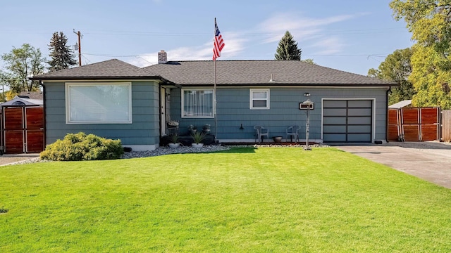 ranch-style house featuring fence, an attached garage, a chimney, concrete driveway, and a front lawn