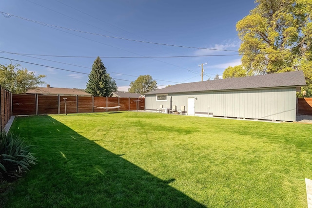 view of yard with a fenced backyard