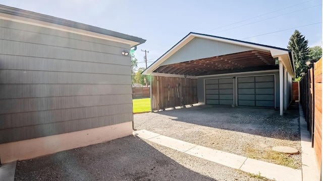 garage with fence