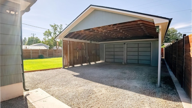 garage with fence