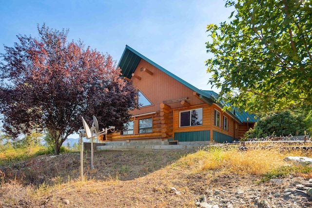 exterior space featuring log siding