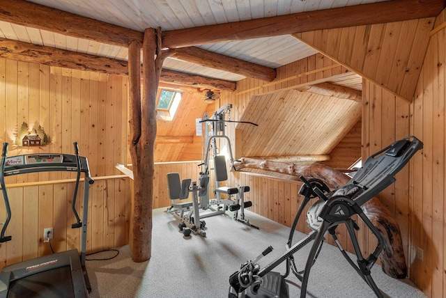 workout area featuring wood ceiling, wood walls, and carpet flooring