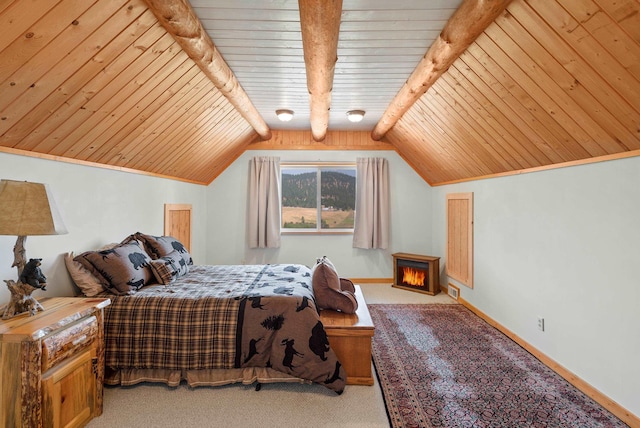 carpeted bedroom featuring visible vents, vaulted ceiling with beams, baseboards, wood ceiling, and a warm lit fireplace