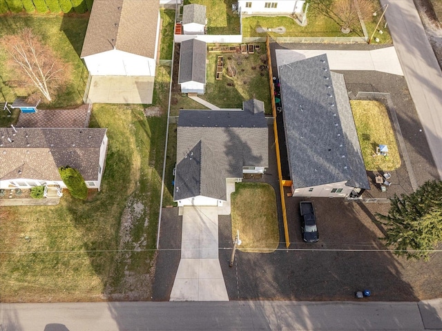 birds eye view of property with a residential view