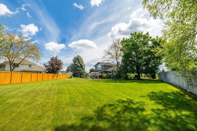 view of yard with fence