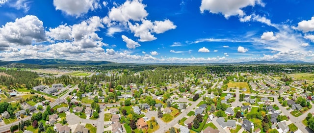 aerial view featuring a residential view and a mountain view